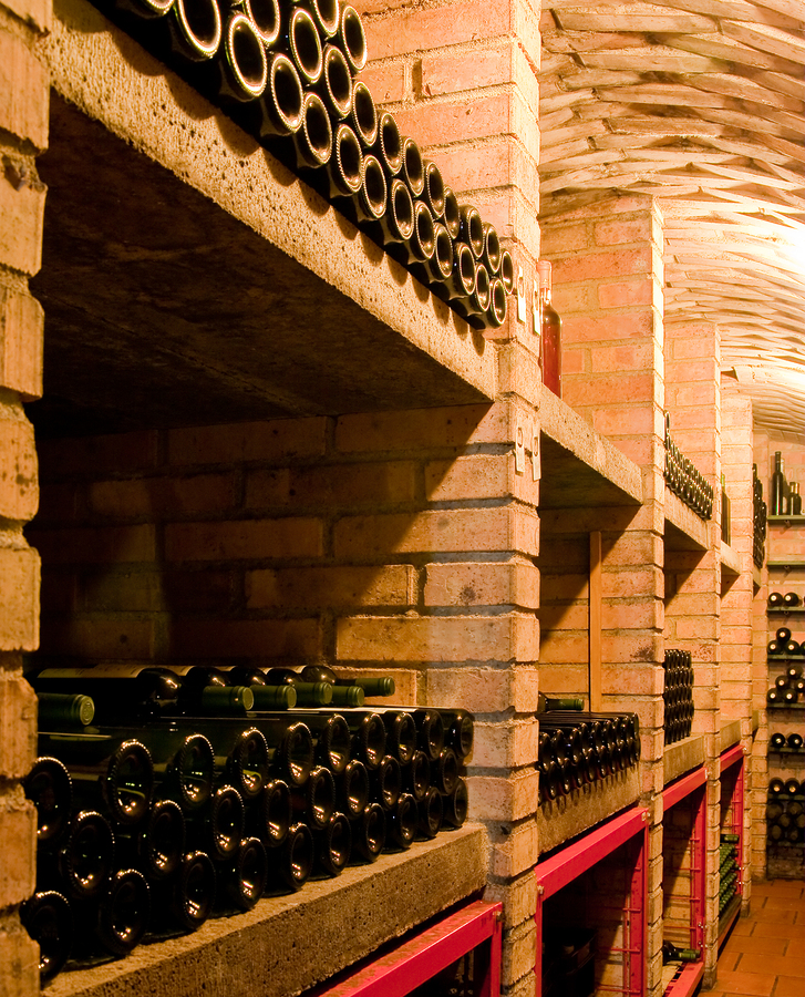 bigstock-stacked-up-wine-bottles-in-the-27148376-by-kubais